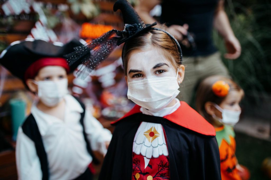 Kids with masks at Halloween